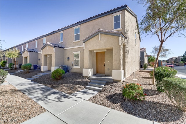 view of front of home featuring central AC unit