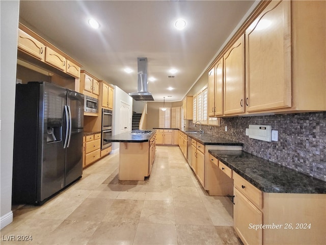 kitchen with sink, a kitchen island, island range hood, appliances with stainless steel finishes, and light brown cabinetry