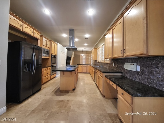 kitchen featuring pendant lighting, sink, a kitchen island, island exhaust hood, and stainless steel appliances