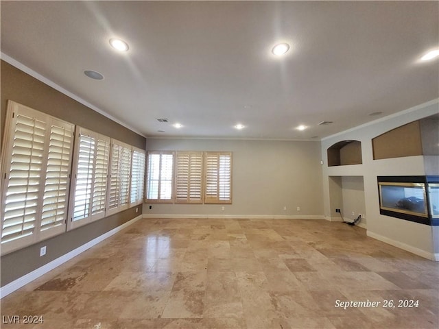 1337 Via Savona Dr, Henderson, NV 89052 - empty room with crown molding, a multi sided fireplace, built in shelves, baseboards, and recessed lighting