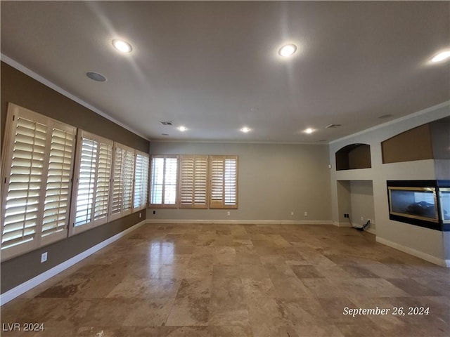 1337 Via Savona Dr, Henderson, NV 89052 - empty room with ornamental molding, a multi sided fireplace, baseboards, and recessed lighting