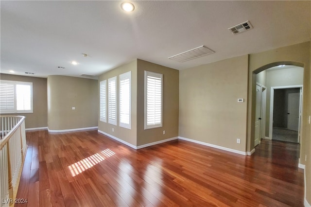 empty room with wood-type flooring