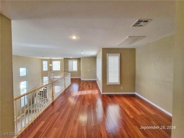 1337 Via Savona Dr, Henderson, NV 89052 - spare room with baseboards and wood-type flooring