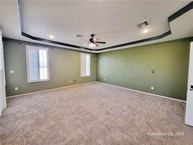 1337 Via Savona Dr, Henderson, NV 89052 - carpeted empty room featuring a tray ceiling, ceiling fan, baseboards, and recessed lighting