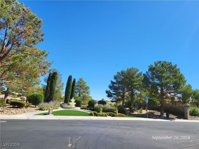 1337 Via Savona Dr, Henderson, NV 89052 - view of asphalt street featuring sidewalks and traffic signs