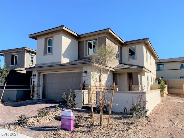 view of front of house with a garage