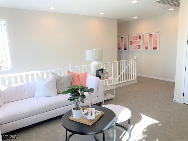 living room with light colored carpet