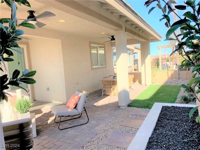 view of patio with ceiling fan