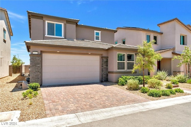 view of front of home with a garage