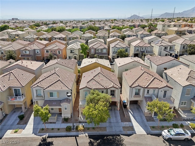 drone / aerial view featuring a mountain view