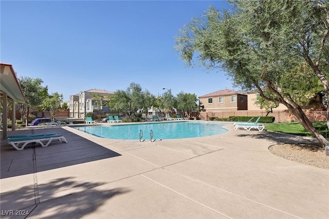 view of swimming pool featuring a patio