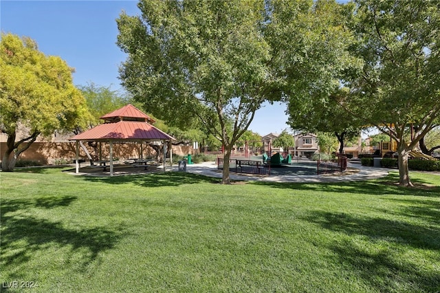 view of home's community with a gazebo and a yard