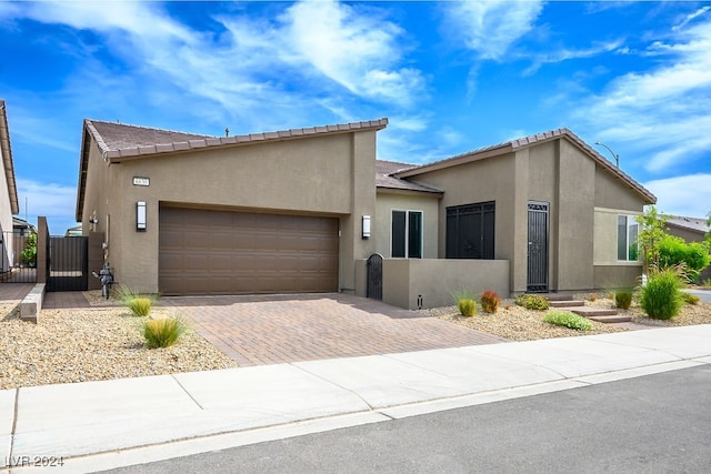 view of front of property with a garage