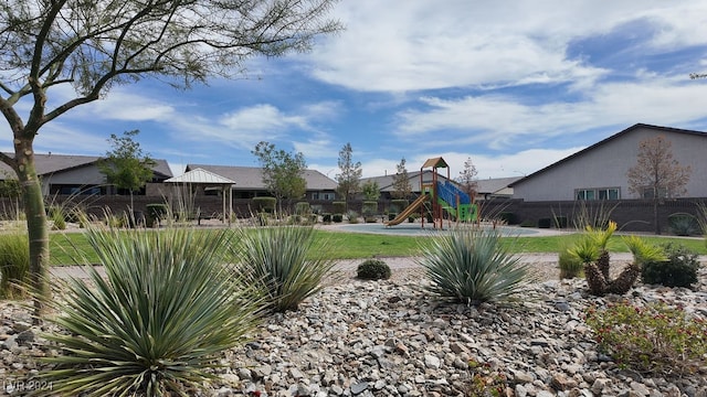 view of yard with a playground and a gazebo