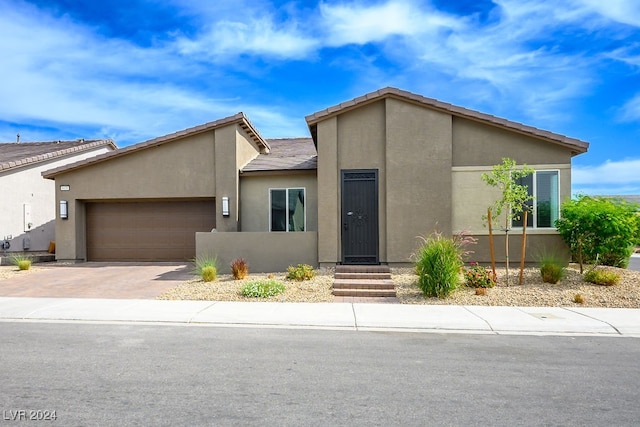 view of front of property featuring a garage