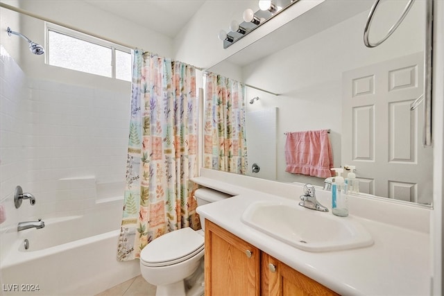 full bathroom with tile patterned floors, shower / bath combo, toilet, and vanity