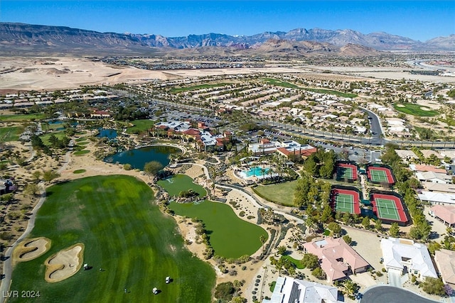 drone / aerial view featuring a water and mountain view