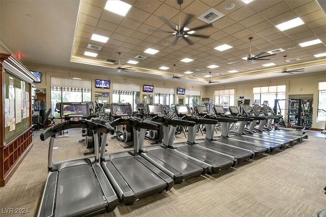 gym with carpet floors and a drop ceiling