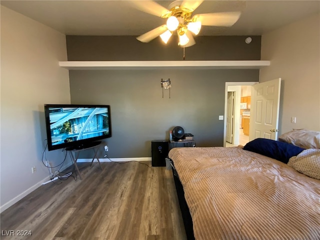 bedroom featuring ceiling fan and hardwood / wood-style flooring