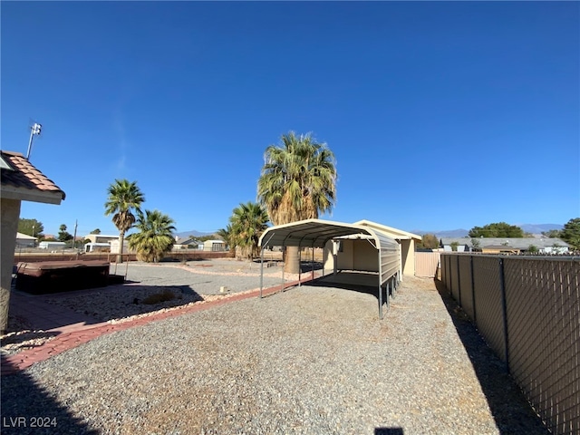 view of yard with a carport