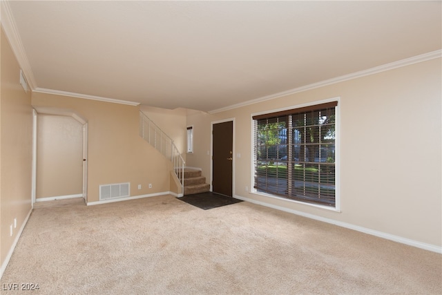 carpeted empty room with ornamental molding