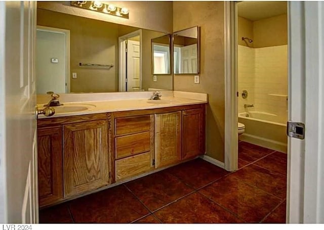 full bathroom with tile patterned flooring, vanity, toilet, and bathing tub / shower combination