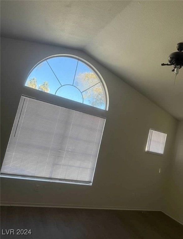 interior space with hardwood / wood-style flooring and ceiling fan