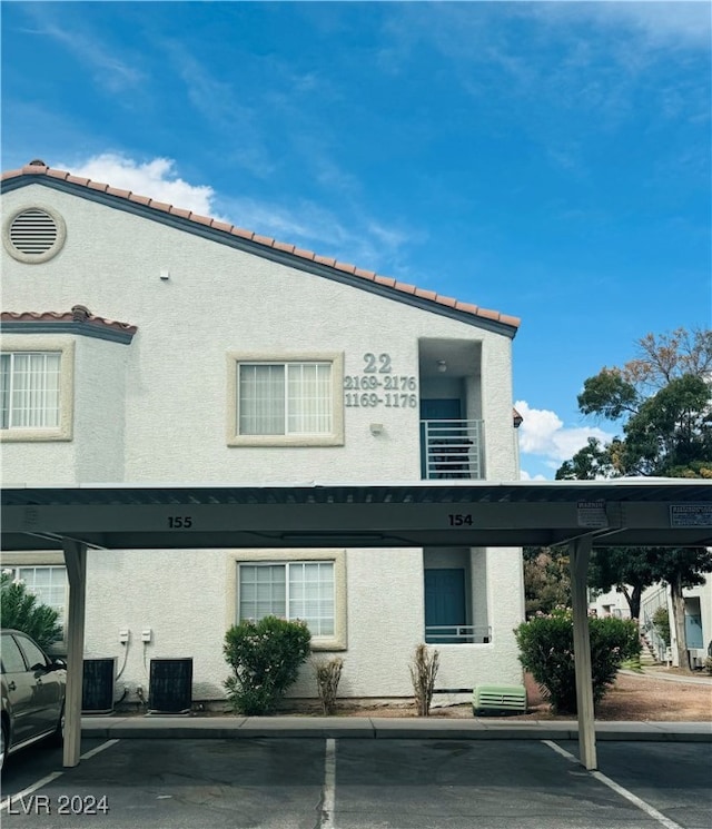 view of property with central air condition unit