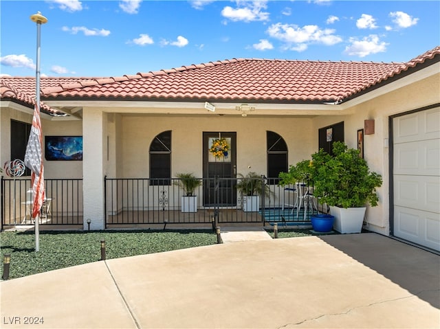 view of front of property with a garage