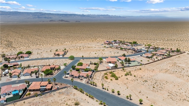 drone / aerial view featuring a mountain view