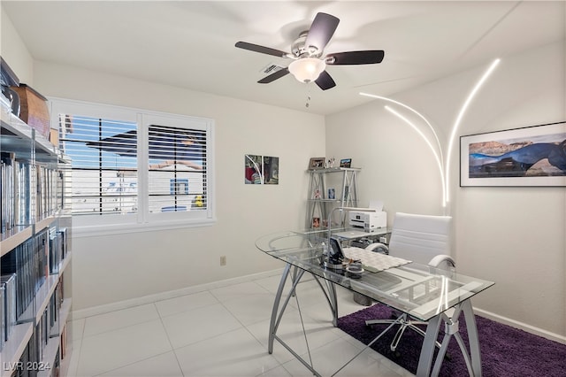 office space featuring light tile patterned flooring and ceiling fan