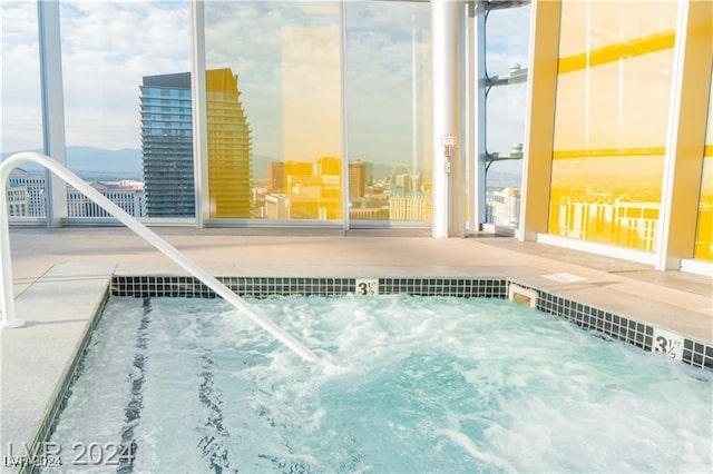 view of pool featuring a community hot tub