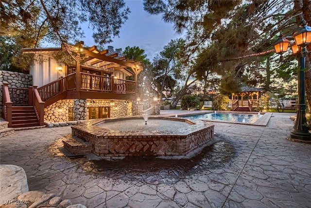 view of home's community with a patio area and a swimming pool