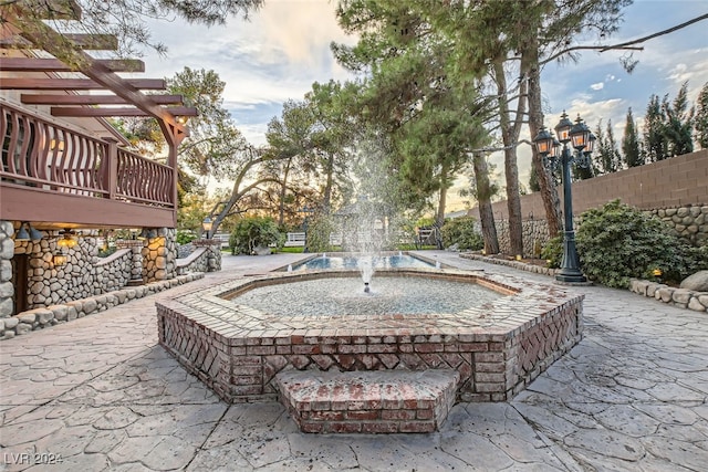 view of home's community featuring a pergola