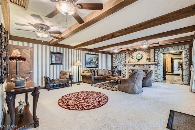 carpeted living room featuring beamed ceiling