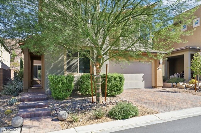 view of front of property featuring a garage