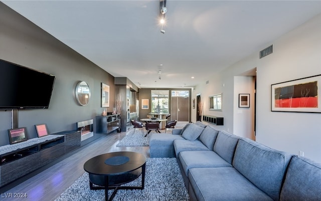 living room featuring light hardwood / wood-style flooring