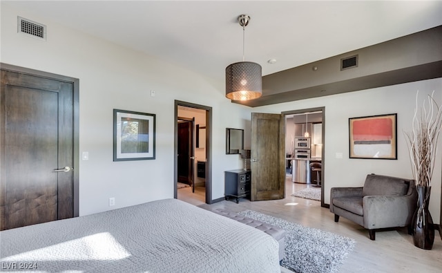 bedroom featuring light hardwood / wood-style flooring