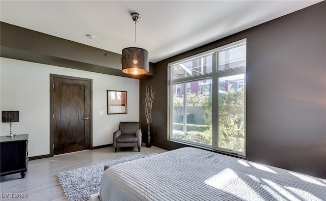 bedroom featuring light hardwood / wood-style floors