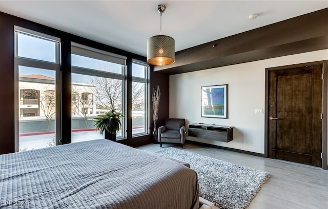 bedroom featuring light wood-type flooring