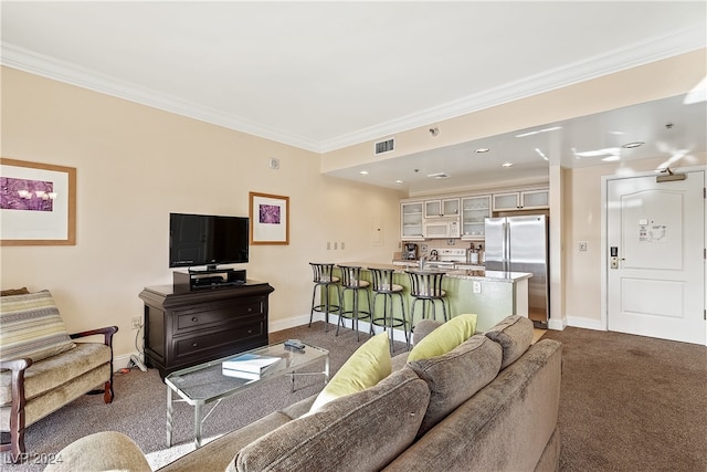 carpeted living room featuring ornamental molding