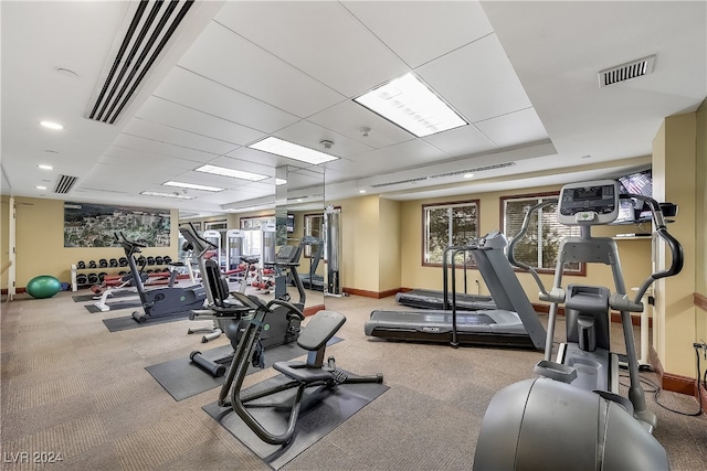 workout area with light colored carpet