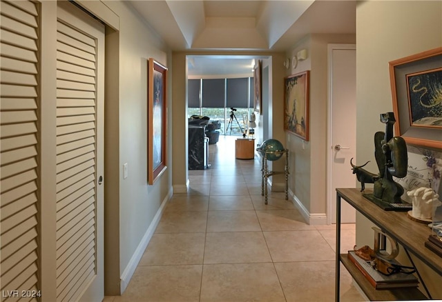 corridor featuring light tile patterned flooring