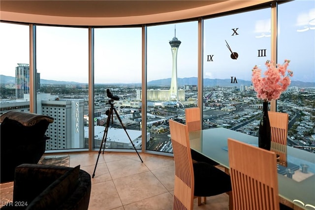 sunroom with a mountain view