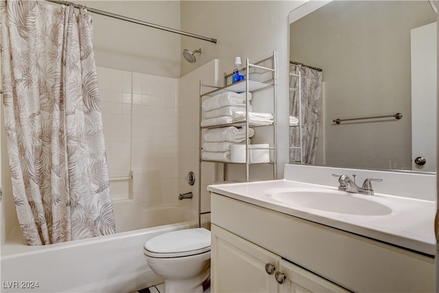 full bathroom featuring shower / tub combo with curtain, vanity, and toilet