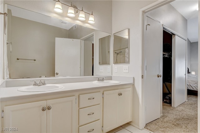 bathroom featuring vanity and tile patterned floors