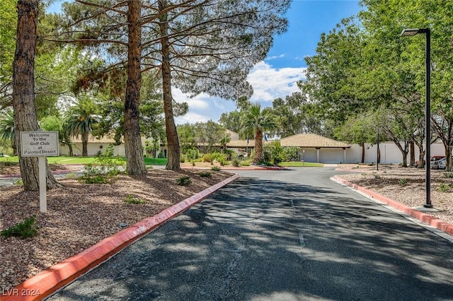 4810 Black Bear Rd Unit 202, Las Vegas, NV 89149 - view of asphalt road with curbs