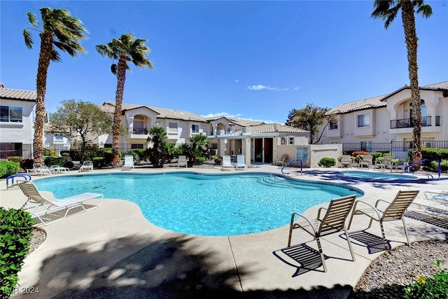 view of pool featuring a patio area