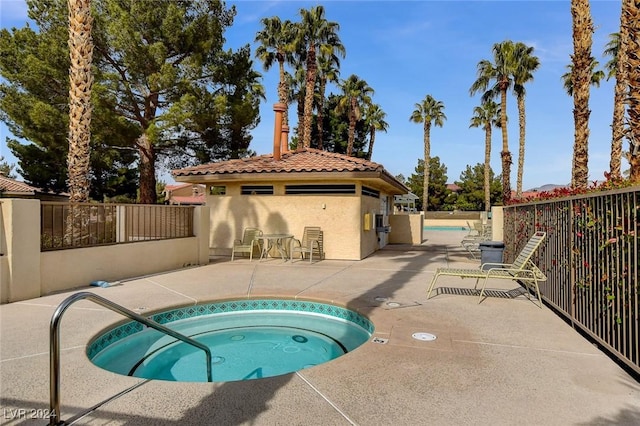 4810 Black Bear Rd Unit 202, Las Vegas, NV 89149 - community pool with a hot tub and a patio