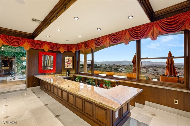 interior space featuring recessed lighting, visible vents, crown molding, and a mountain view